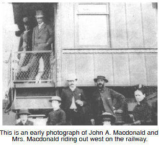 Early photograph of John A. Macdonald and Mrs.Macdonald riding on the railway