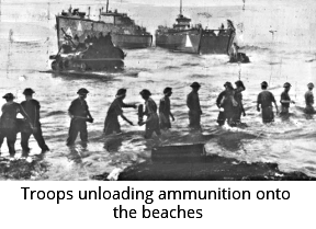 Troops unload ammunition onto the beaches